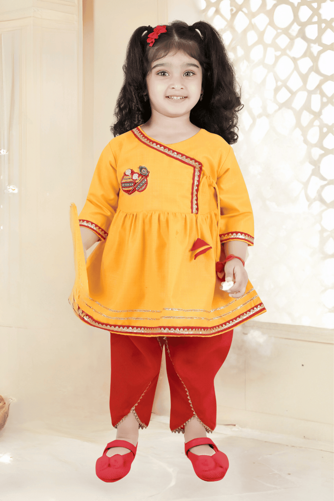 Yellow with Red Pearl, Stone and Beads work Dhoti Style Peplum Kurti for Girls - Seasons Chennai