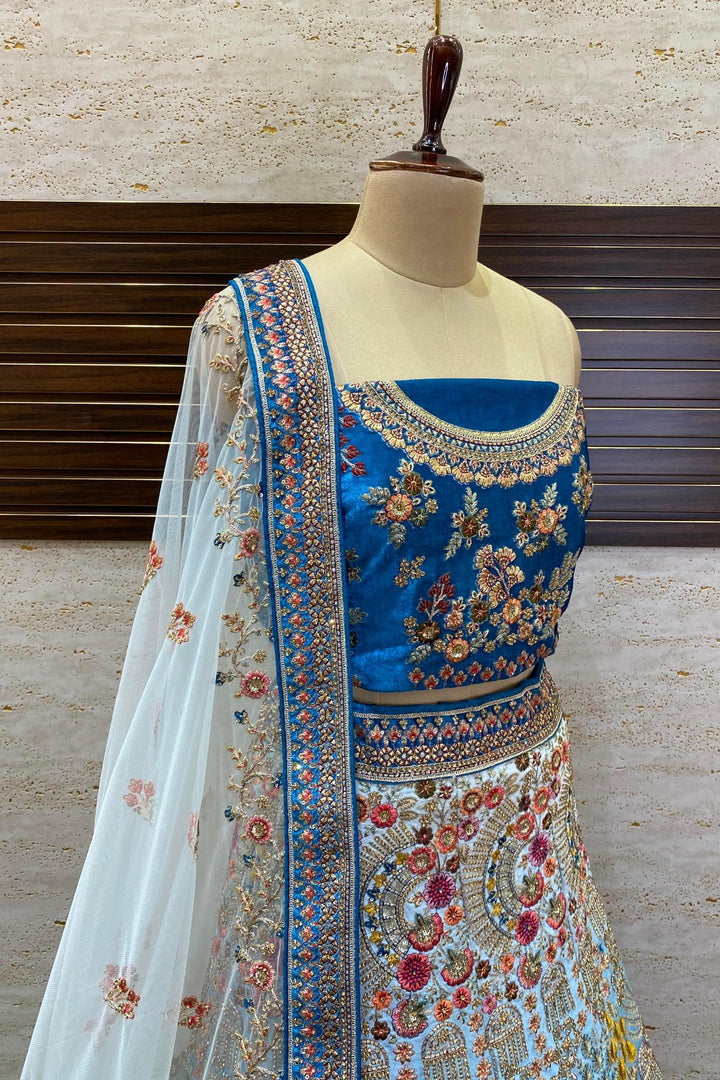 Pale Blue and Peacock Blue Stone, Thread and Zari work Semi Stitched Designer Bridal Lehenga - Seasons Chennai