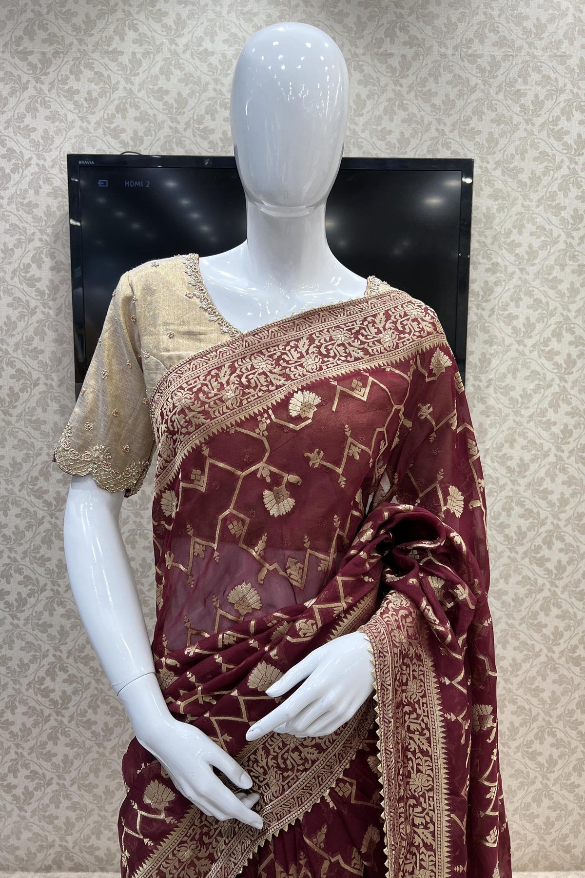 Burgundy plain body georgette designer saree features contrast black color  border & blouse of sequin work & embroidery