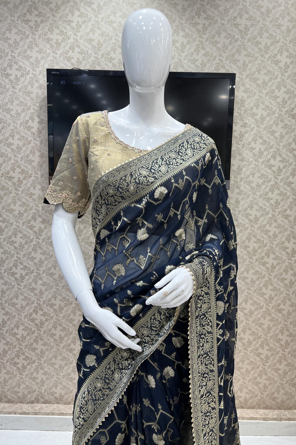 Nalli - This exquisite range of Banarasi georgette sarees adorned with  gorgeous zari buttas and zari border makes it the perfect choice for the  party. Shop Now at https://www.nalli.com/black-banarasi-georgette-saree-es0076344  https://www.nalli.com ...